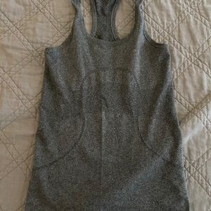 Gray running tank